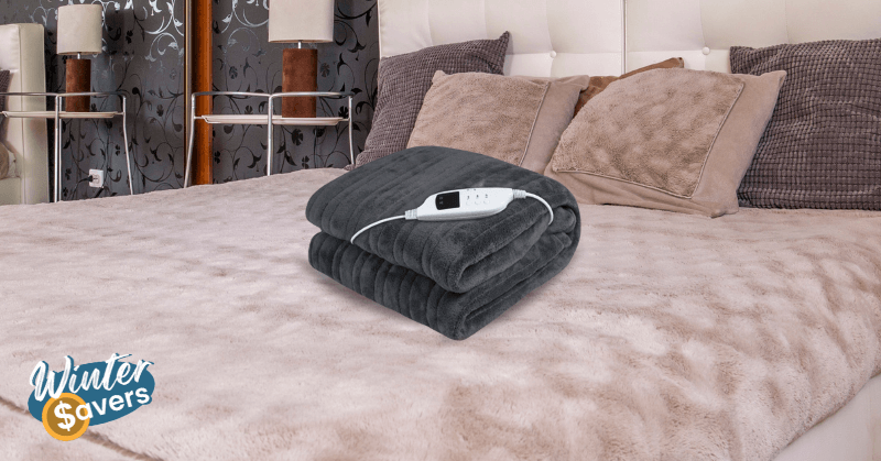 Grey electric throw rug on bed Grey electric throw rug on bed
