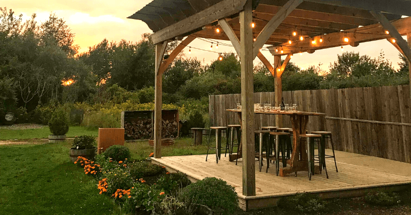 Outdoor dining area with warm lighting Outdoor dining area with warm lighting