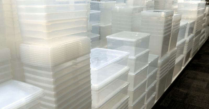 Plastic bins stacked for organisation