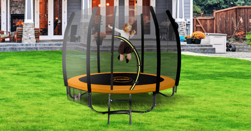 Young girl bouncing on a trampoline outdoors Young girl bouncing on a trampoline outdoors